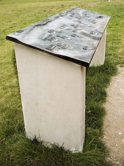 The images shows a tactile map of the view seen from this high point on the Dunstable Down. The map has the bumpy hills which characterise the area as well as the names and symbols for many of the landmarks.